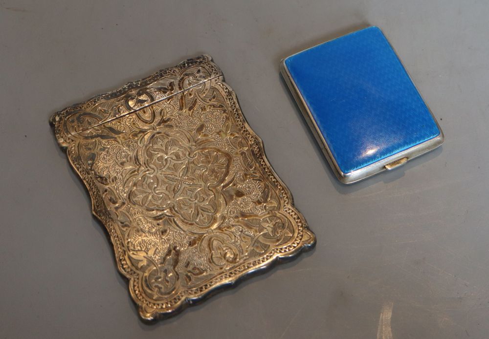 A 1920s silver and enamel match-case, London, 1928, 59mm and a Victorian engraved silver card case